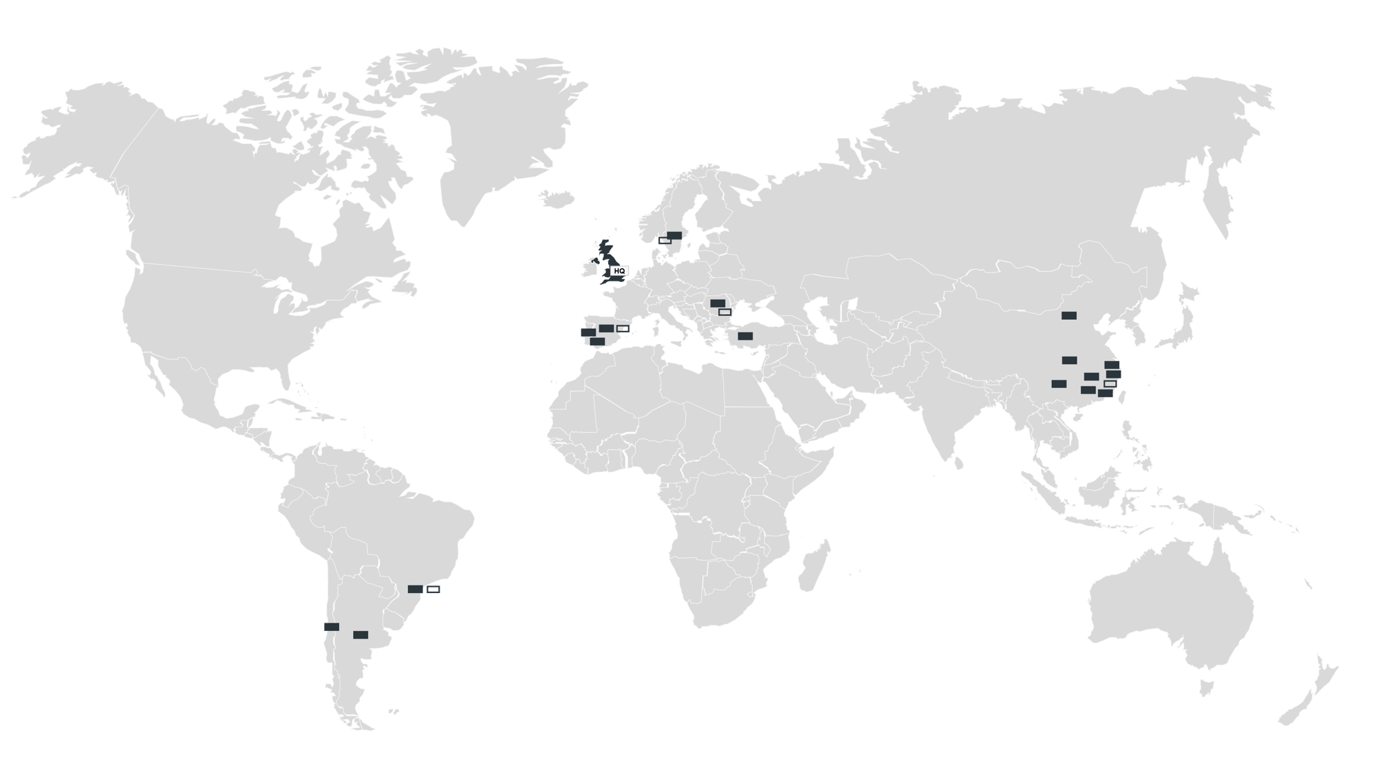 World map showing the locations of headquarters, manufacturing plants, and R&D facilities across different countries, highlighted with gray boxes